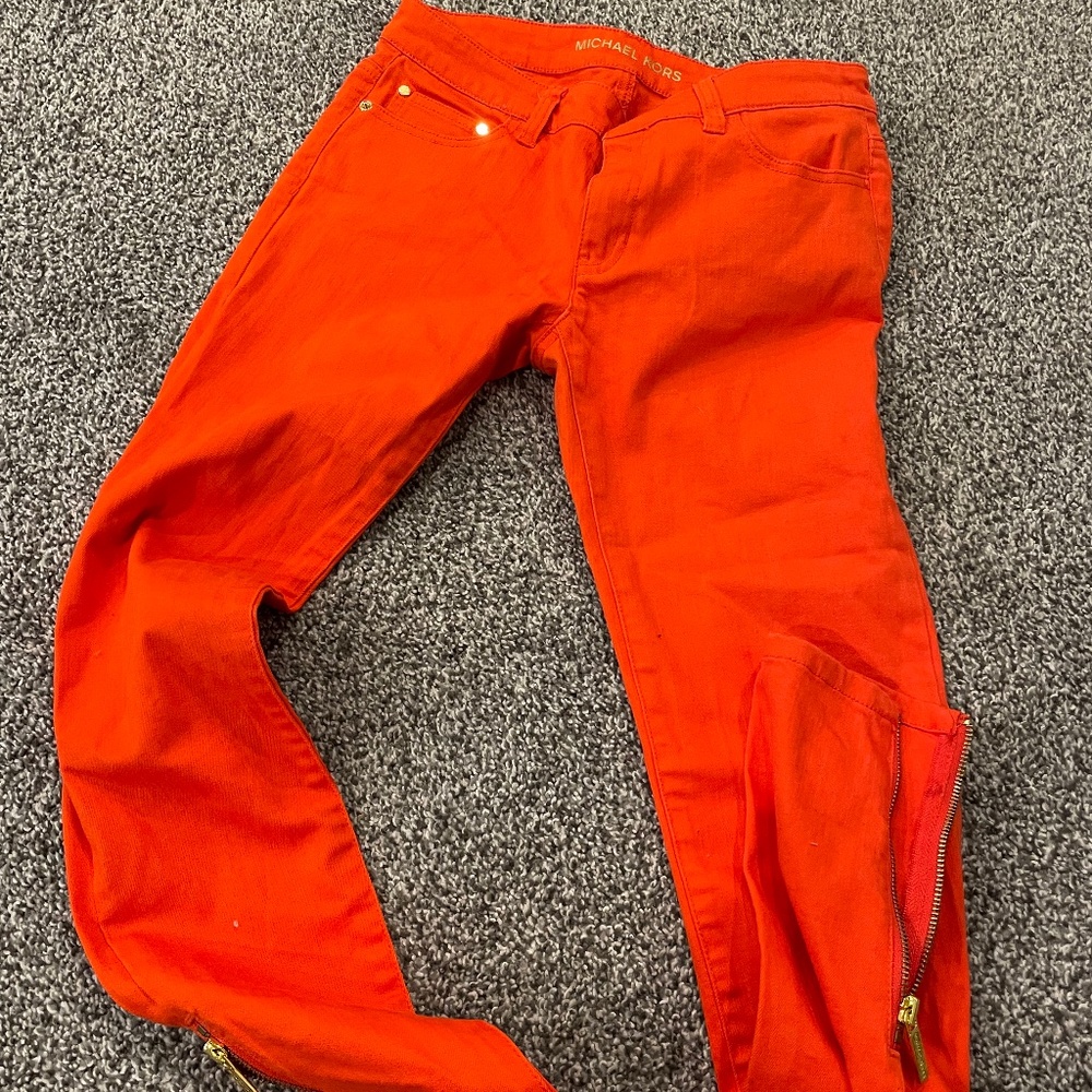 Michel Kors orange jeans